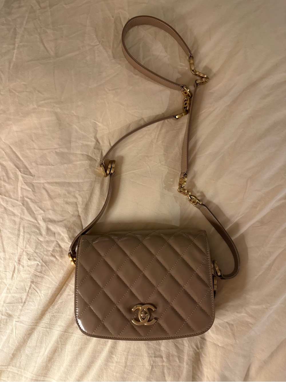 CHANEL Quilted Patent Lambskin Crossbody in Taupe Beige with Gold Hardware